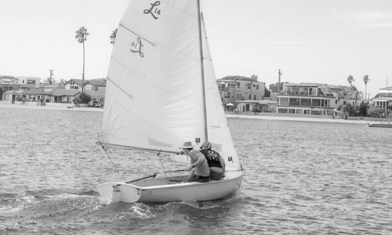 Paul sailing on Mission Bay with his father on their Lido 14 foot sailboat