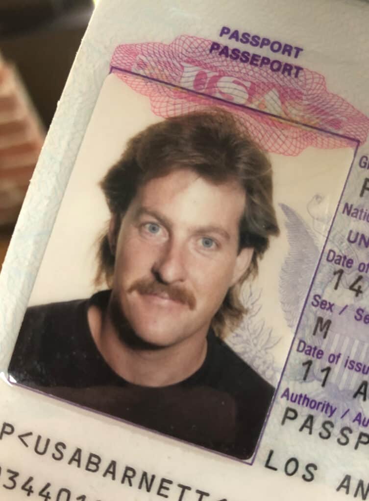 A photo of the author from many years ago that shows of his mustache and mullet.