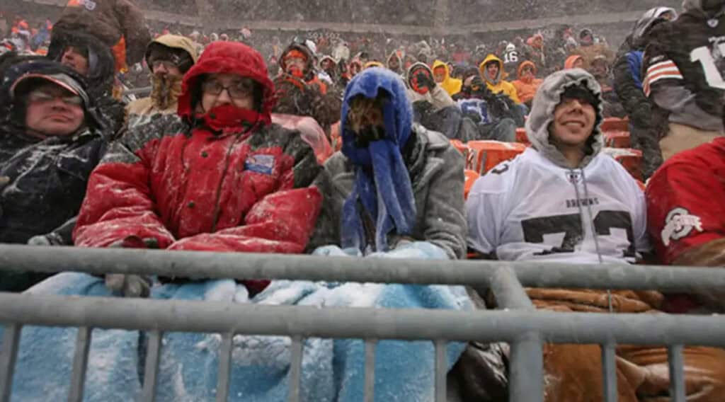 Football fans in the snow.