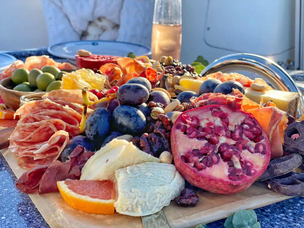 A platter of fresh fruit and cheese