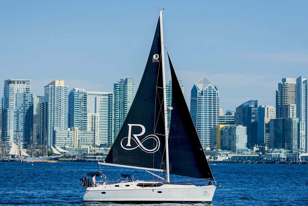 Riviera sailboat with the downtown San Diego skyline in the background.