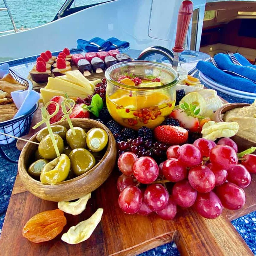 Colorful charcuterie board served during a sail on the Riviera.