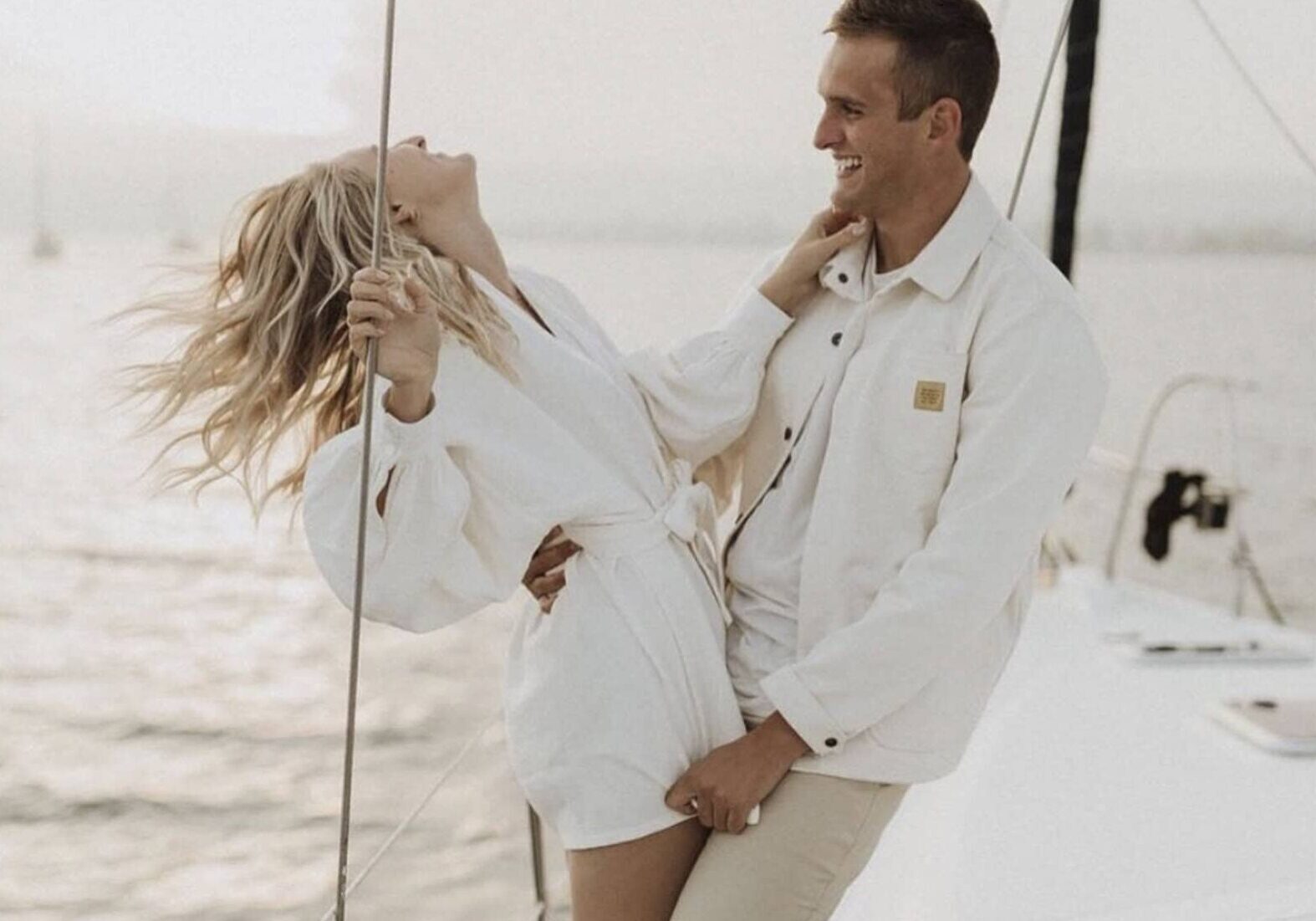 A couple basks in the joy of their new engagement while aboard the SV Riviera.